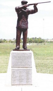 Note this bronze statue honoring the Grand American is using a side/side double barrel hammer shotgun, as commonly used a century ago. Although pump action and autoloading shotguns have been used to win various events over the years, the 1959 Grand American Handicap winner did it with a ‘pre-owned’ Winchester Model 12 shotgun. They are seldom seen on the line anymore.